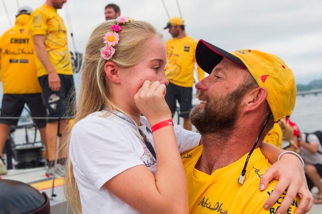Victorious Volvo Ocean Race leg five skipper Ian Walker is welcomed to the Itajai pontoons by his daughter - Volvo Ocean Race 2015 &copy;  Ian Roman / Abu Dhabi Ocean Racing